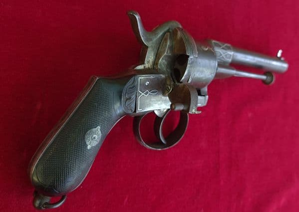 X X X SOLD X X X A scarce double action pinfire revolver with silver inlay. Circa 1865. Ref 3336